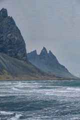 The Vestrahorn mountain on the Icelandic coast jut directly out of the ocean