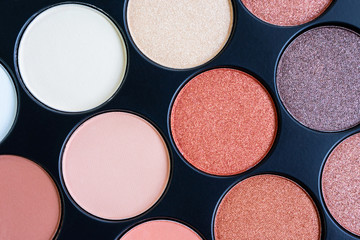 Beautiful colorful eyeshadow palette. Makeup. Beauty products. Tool for makeup artist. Decorative cosmetic. Brown eye shadow. Beauty salon. flat lay. closeup. Trendy colors.