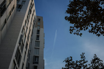 The plane and its footprint in the blue sky. 