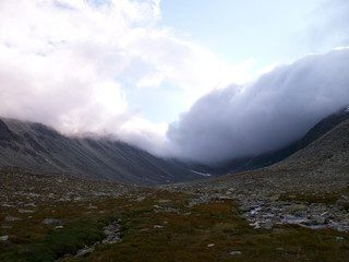 Heavy clouds in a mountain valley in Norway