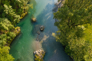 Naklejka na ściany i meble aerial view of the Serio river during the day, Val Seriana Bergamo.
