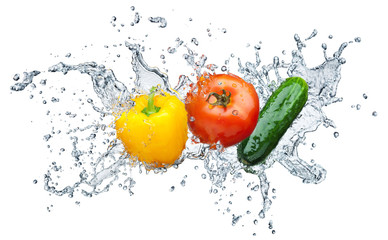 tomato, cucumber, pepper in spray of water © lotus_studio