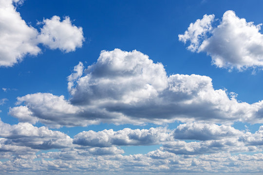 Beautiful blue sky with white clouds above the sea for background