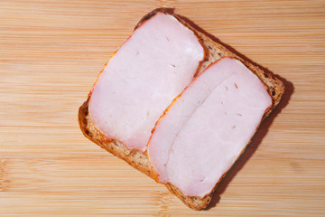 A simple homemade sandwich. Bread and ham
