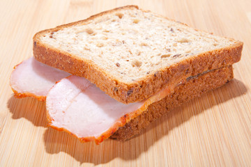 A simple homemade sandwich. Bread and ham