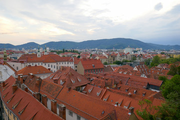 Fototapeta na wymiar Graz city, beautiful old town in Austria and red roofs.