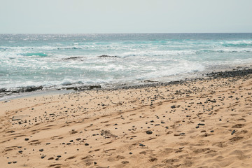 Beautiful view of the sea and the beach of the dunes of Corralejo