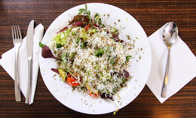 Salad in a white plate