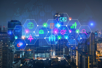 Night time cityscape of big city view background with Research and development theme drawing hologram. Data concept. Multiexposure