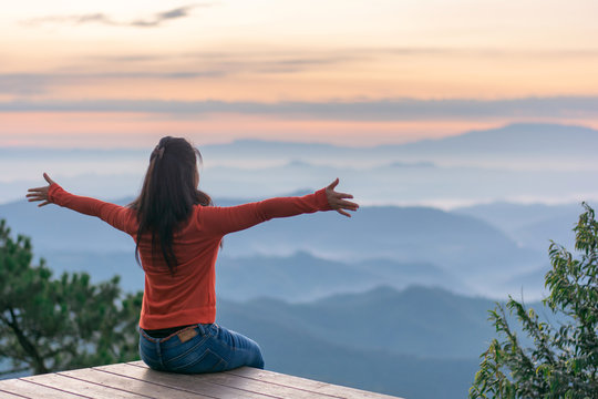 Happy Traveler On Mountain Summit Hands Raised Travel Lifestyle Freedom Concept Adventure Active Vacations Outdoor Over Clouds Harmony With Nature