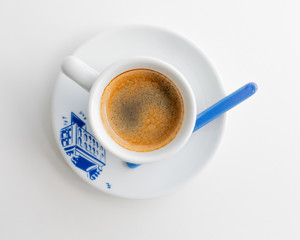 Espresso in a white cup with a blue print