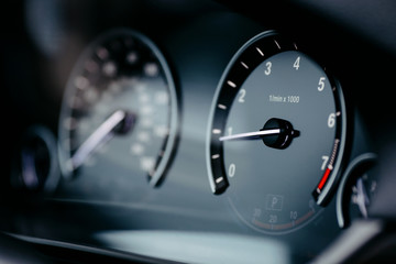 Modern Car Dashboard with Speedometer and Tachometer