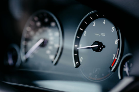 Modern Car Dashboard with Speedometer and Tachometer