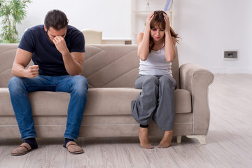 Obraz premium Young couple in domestic violence concept
