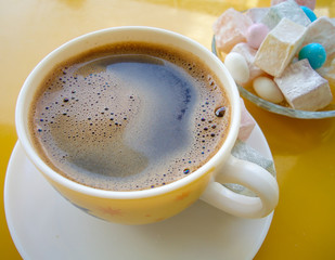 cup of coffee and lokum sweets