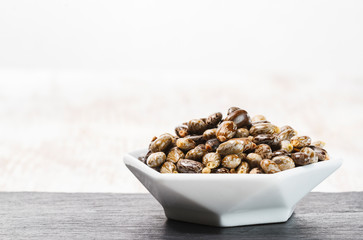 castor oil seeds isolated on white background