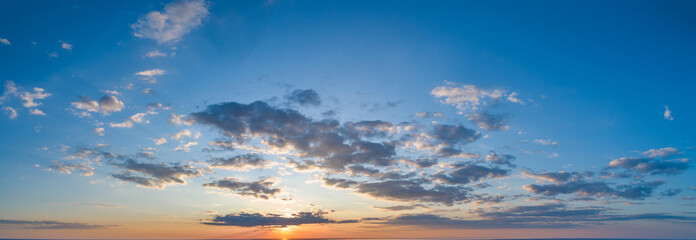Obraz na płótnie Canvas Sunset sky with multicolor clouds