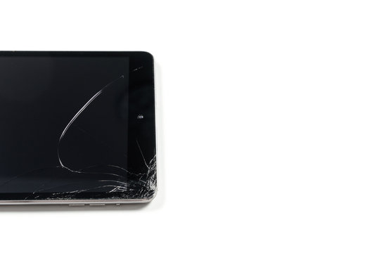 Close-up shoot of tablet with broken touch screen. 