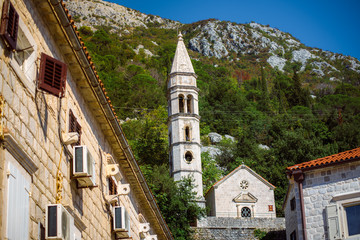 Fototapeta na wymiar Old Church st. Eustachius Building on street old town Dobrota Kotor Montenegro trip travel
