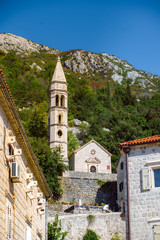 Fototapeta na wymiar Old Church st. Eustachius Building on street old town Dobrota Kotor Montenegro trip travel