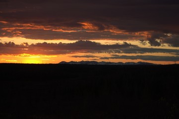 Orange sunset at the beginning of the Polar summer