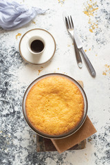 Delicious carrot cake with powdered sugar on a white background