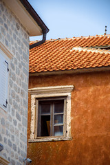 Fototapeta na wymiar Old Building on street old town Dobrota Montenegro trip travel summer