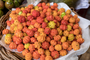 Barbados cherry fruits sale at market in Funchal on Madeira