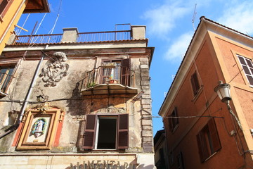 Mediterranean city street view with medieval historic buildings