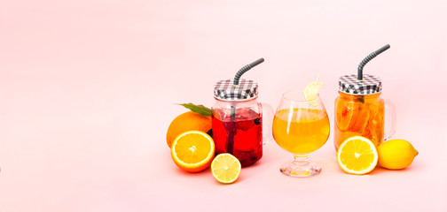 Quarantini or homemade alcohol drink and tropical fruit cocktails on pink background. The concept of new popular drinks. Close-up