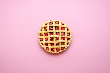 Lattice crust pie top view. Rhubarb-strawberry cake.