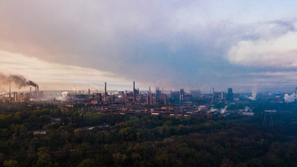 Fototapeta na wymiar industry metallurgical plant dawn smoke smog emissions bad ecology aerial photography