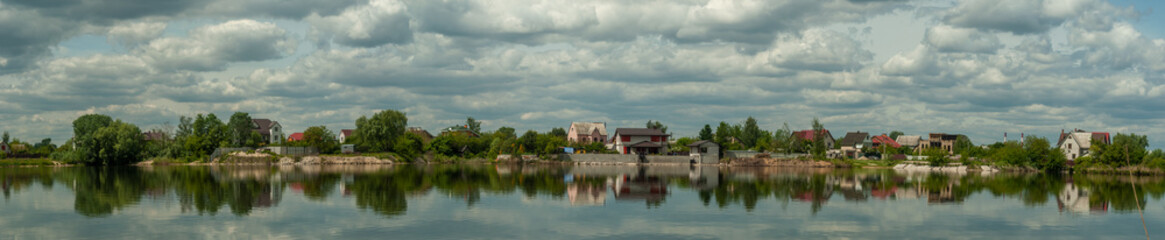 Fototapeta na wymiar Landscape panorame on small vilage near Kyiv