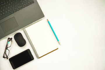 new ideas concept. notebook with copy space , paper balls, samrtphone, laptop, pencil.