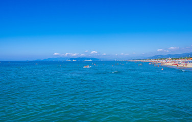 Forte dei Marmi, Italy - August 18, 2019: Mediterranean Sea and Forte dei Marmi one of the most known and trendy seaside resorts in Tuscany and Italy
