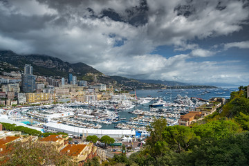 Fototapeta na wymiar Monaco, Monte-Carlo, The famous place in Monaco - port Hercules, view from old town, a lot of boat, mega yachts and sail boats