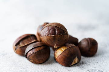 Chestnuts peeled and peeled in a white bowl