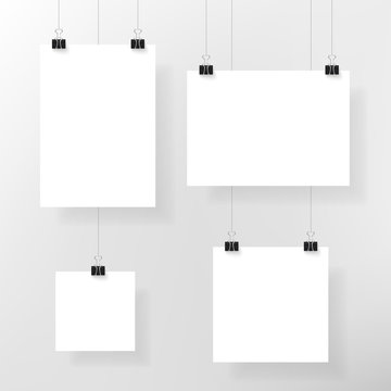 Paper sheet mockup set. Paper frames on clips. Vector illustration.