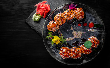 sushi roll with fish in plate