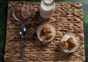 eggs of milk, typical dessert of Extremadura, fried dough with milk, cinnamon and cocoa sprinkled