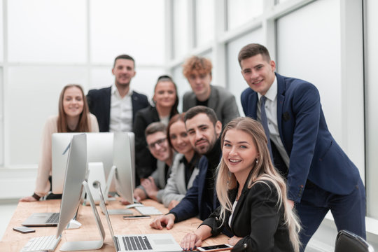 large group of employees in the workplace in the office
