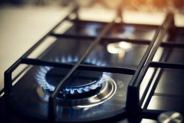 Kitchen gas cooker with burning fire propane gas
