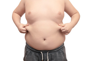 Naklejka premium Overweight, obesity. The body of a teenager on a white isolated background.