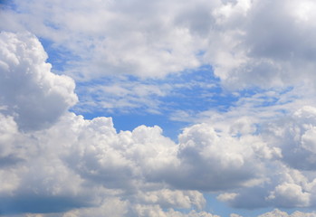 White clouds and the blue sky on a sunny day