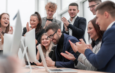 happy working group applauds the project Manager