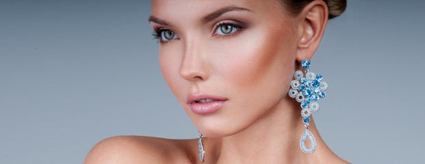 beautiful woman model with professional makeup, in jewelry