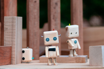 DIY wooden toy of the robot. ecology technology concept. recycled materials.