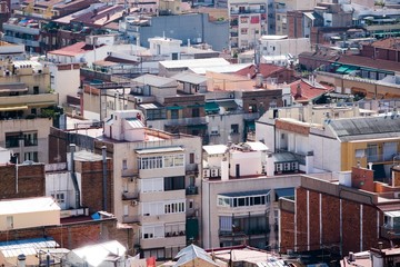 Fototapeta premium close up shots of various colourful houses roofs of Barcelona in a beautiful sunny day from high point of view