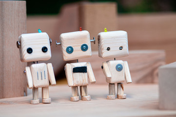 DIY wooden toy of the robot. ecology technology concept. recycled materials.