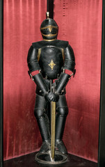 Military armor worn by soldiers in medieval times. Corvin Castle, also known as Hunyadi Castle,...